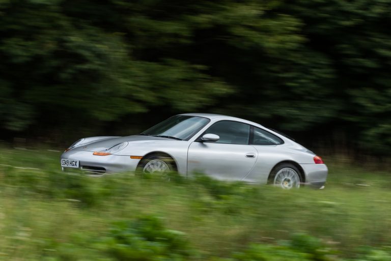 Silver Porsche 996 tracking shot
